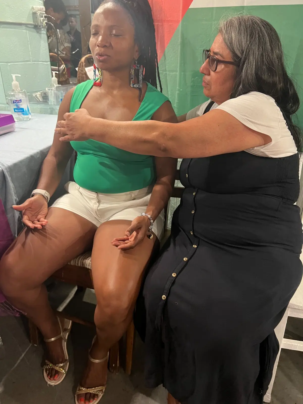 Practitioner guiding a participant