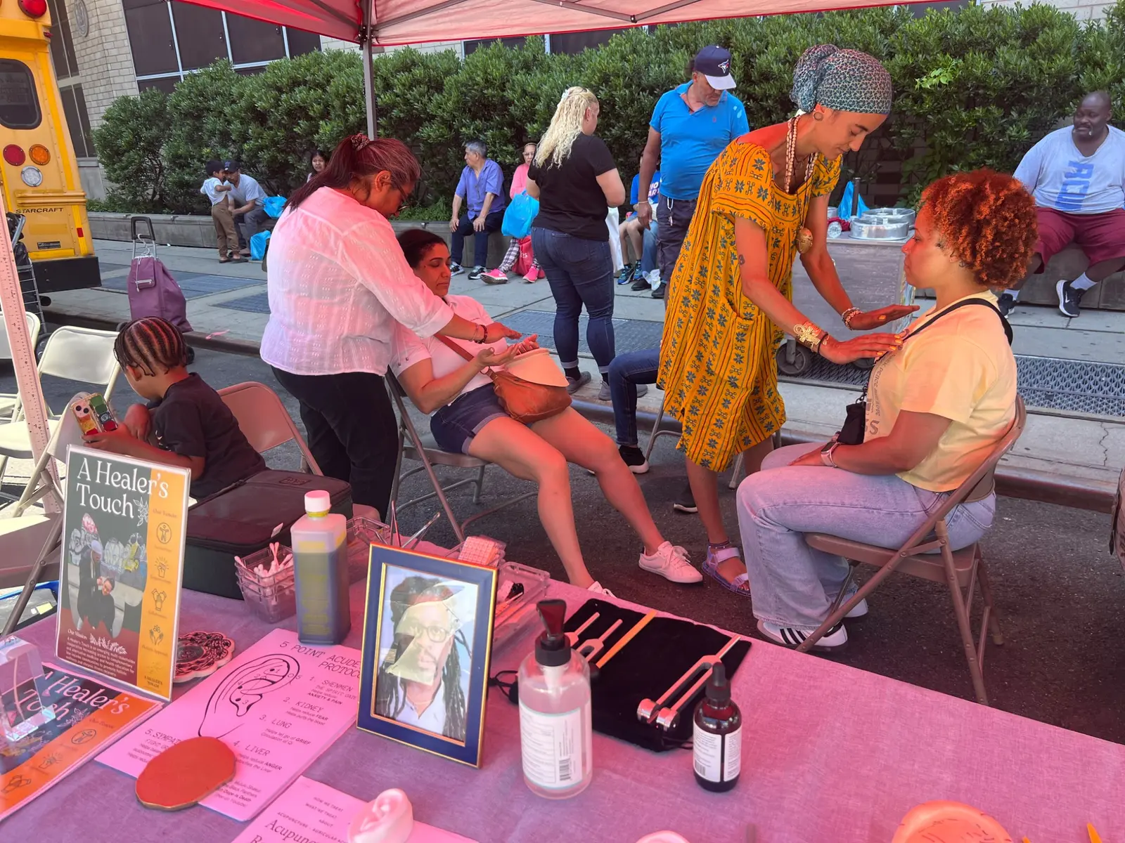 Practitioners offering care at a summer pop-out